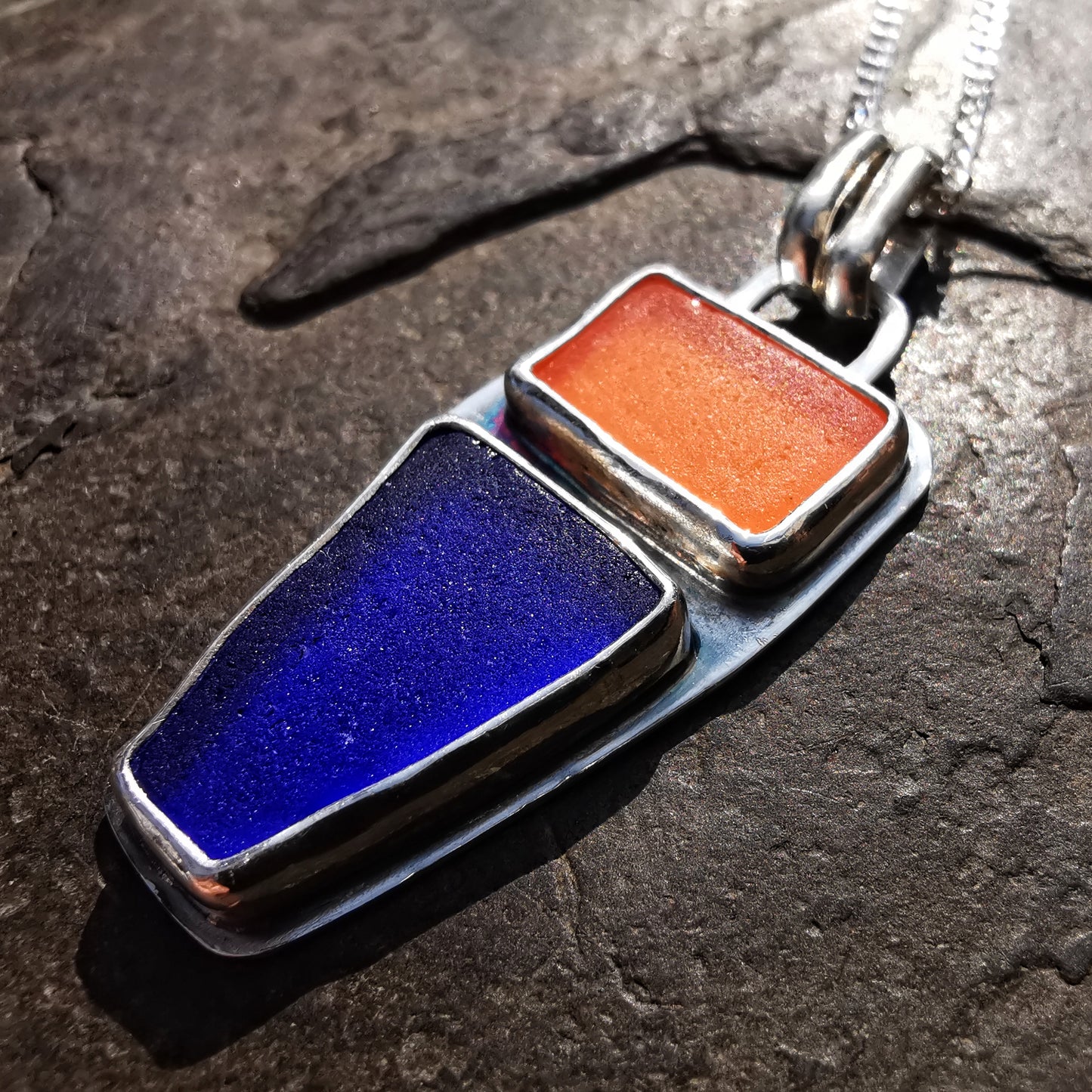 Scottish orange and blue sea glass & sterling silver pendant.