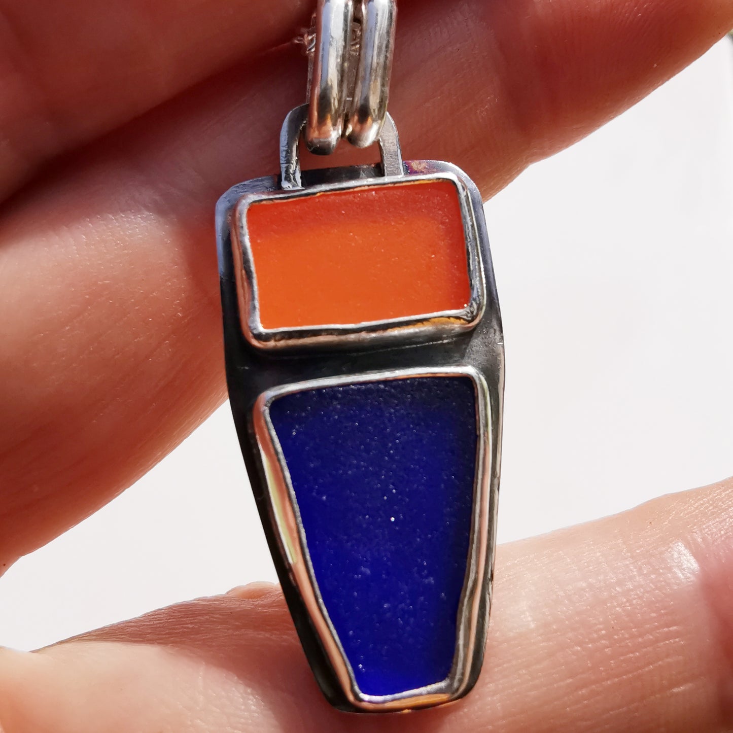 Scottish orange and blue sea glass & sterling silver pendant.