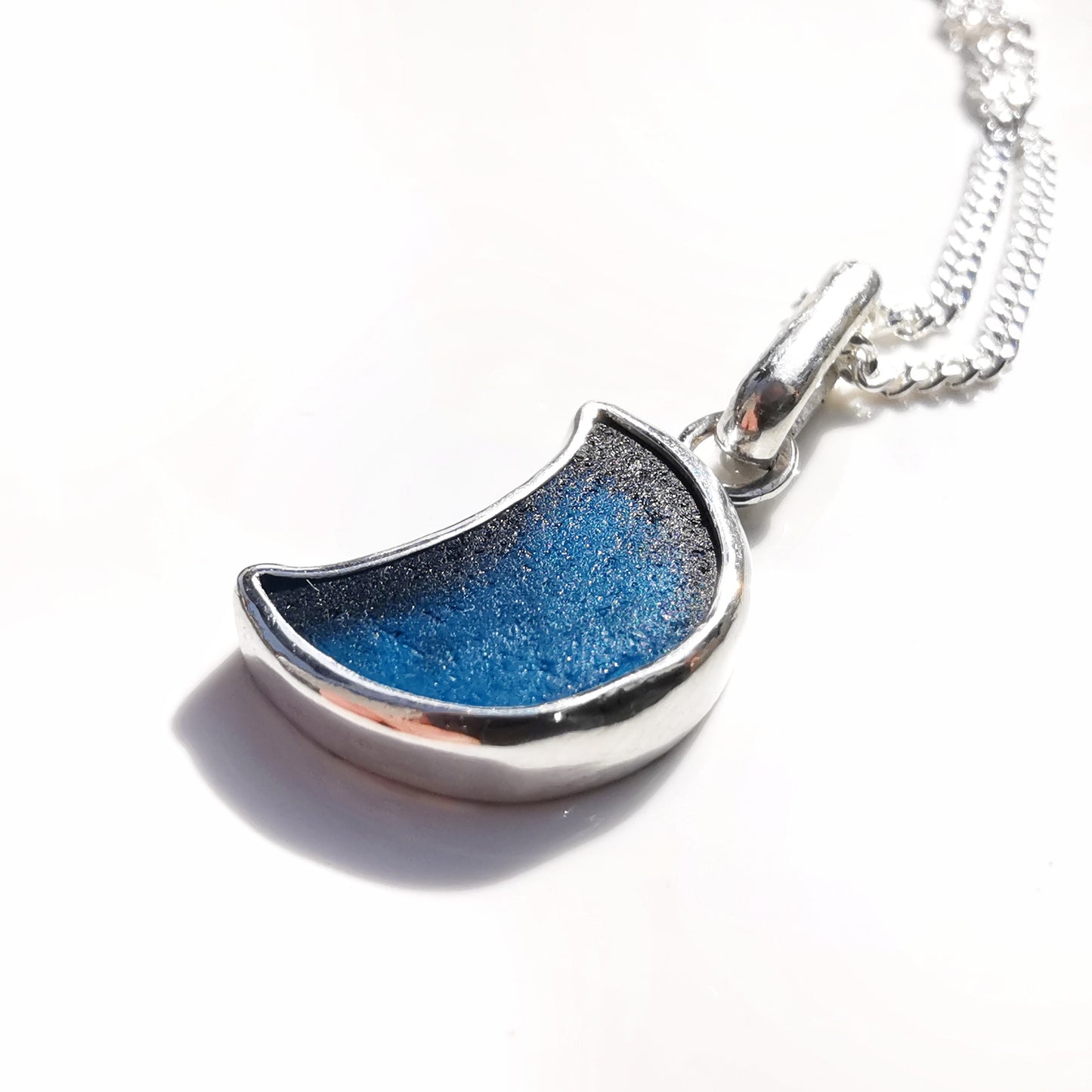 Scottish teal blue crescent moon sea glass & sterling silver pendant.