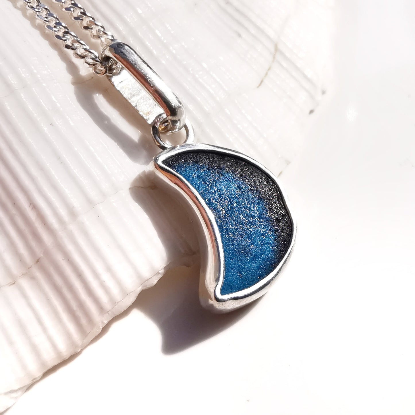 Scottish teal blue crescent moon sea glass & sterling silver pendant.