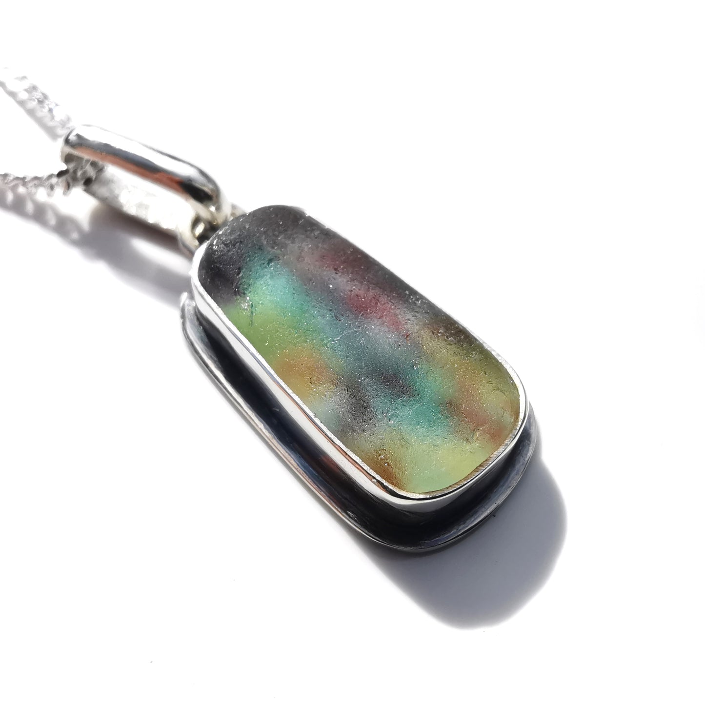 Scottish multi coloured sea glass & sterling silver pendant.