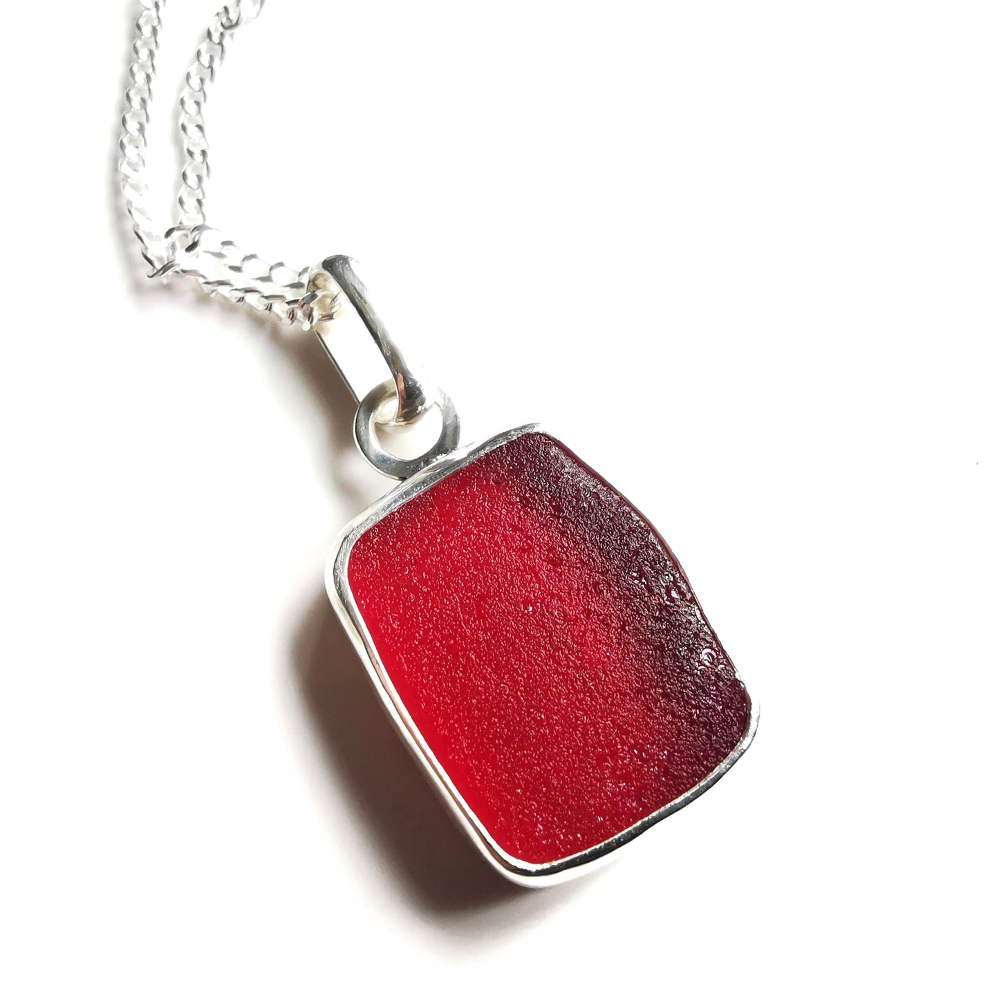 Scottish red UV sea glass & sterling silver pendant.