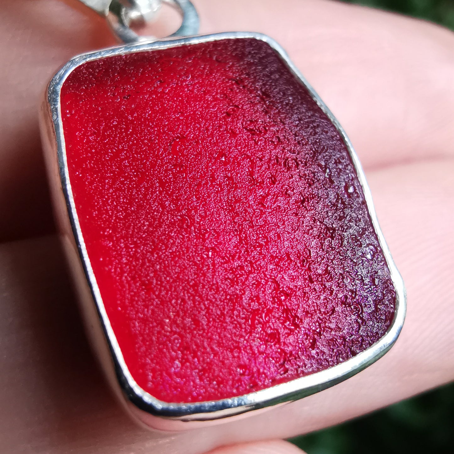 Scottish red UV sea glass & sterling silver pendant.