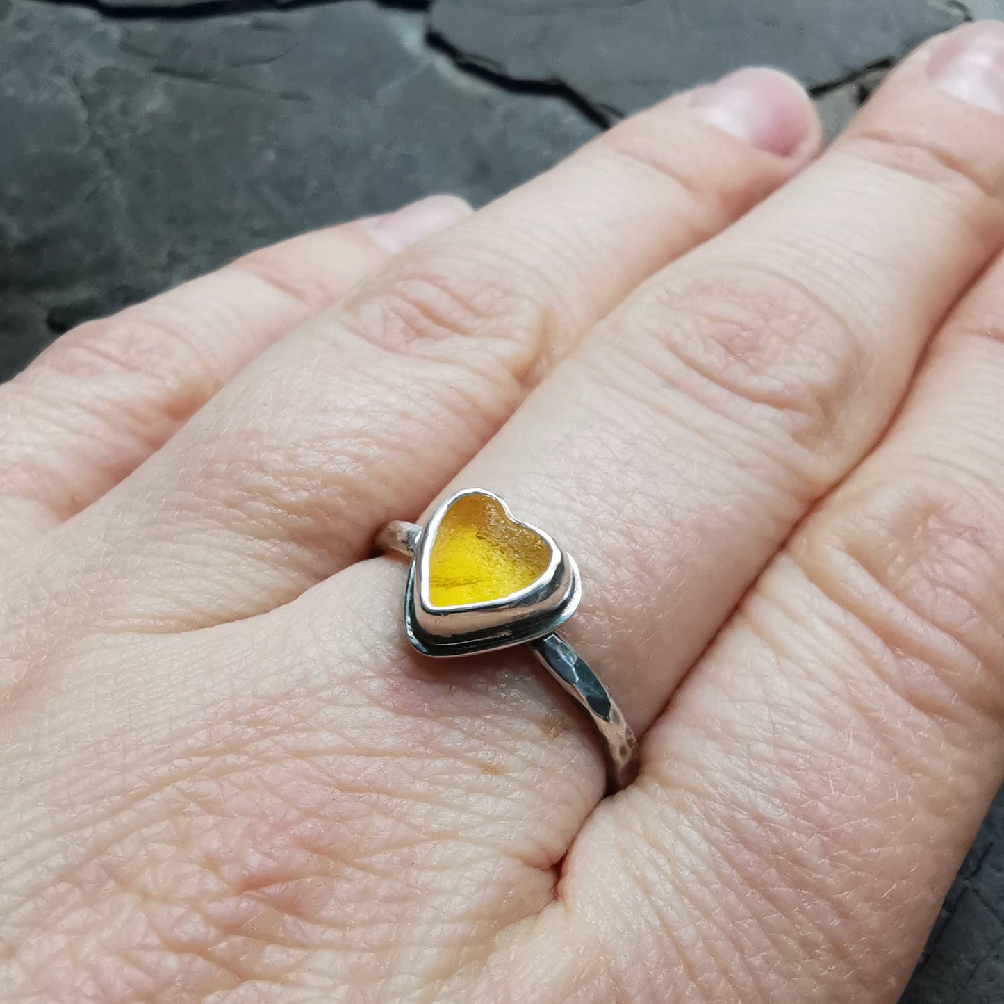 Tiny Scottish yellow UV sea glass heart, adjustable sterling silver ring.