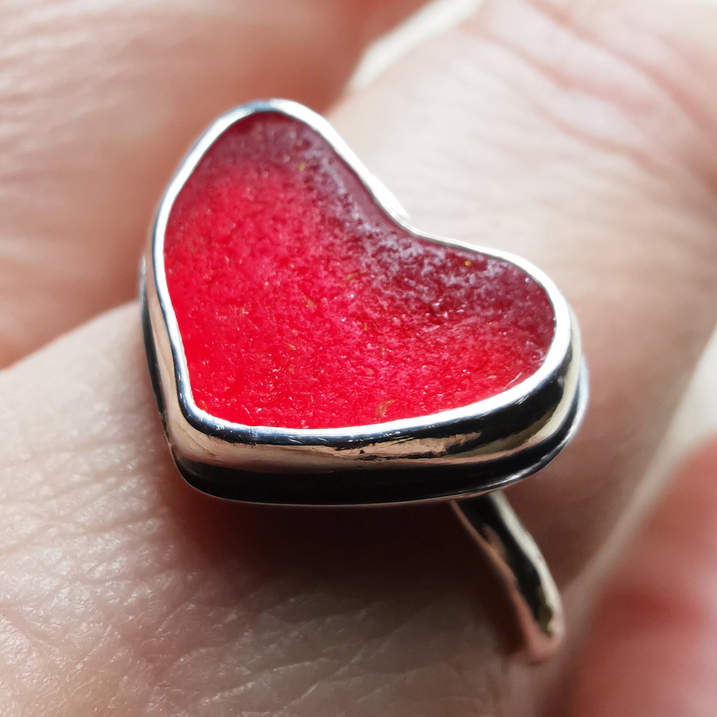 Red UV sea glass heart & sterling silver adjustable ring.