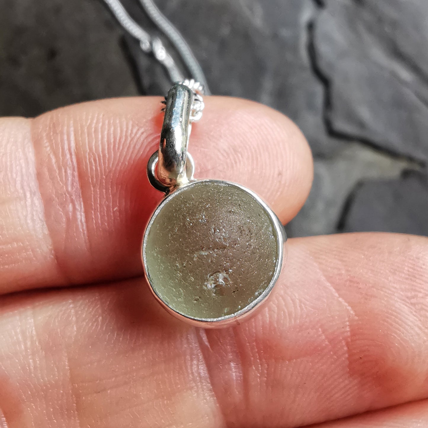 Genuine tiny Scottish Codd sea glass marble & sterling silver pendant.