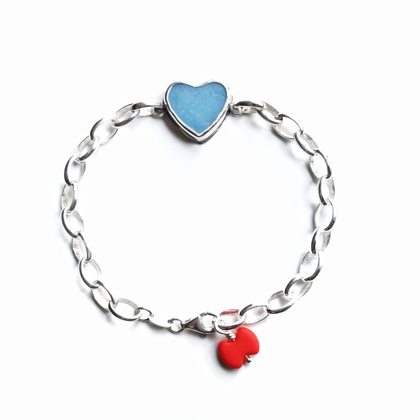 Blue sea glass heart & sterling silver bracelet.