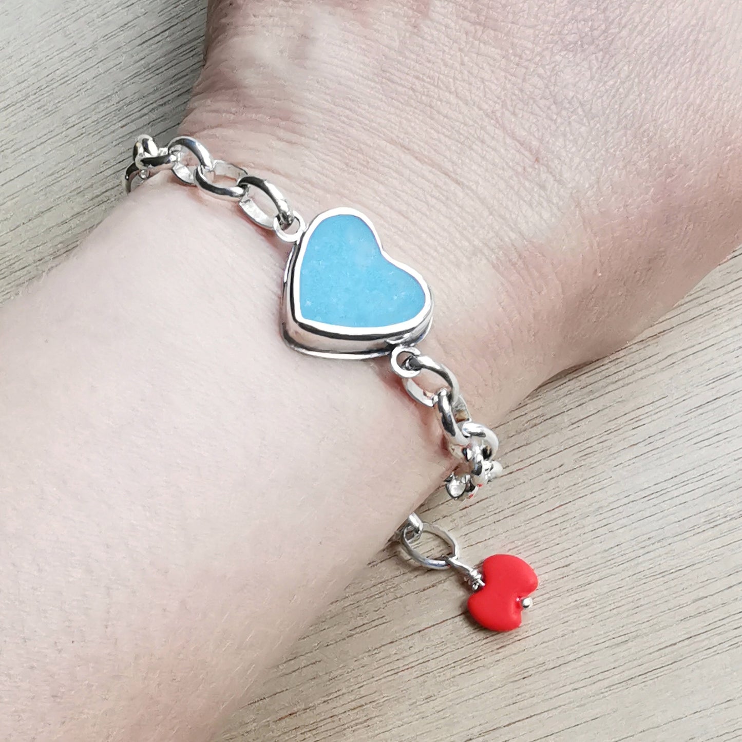 Blue sea glass heart & sterling silver bracelet.