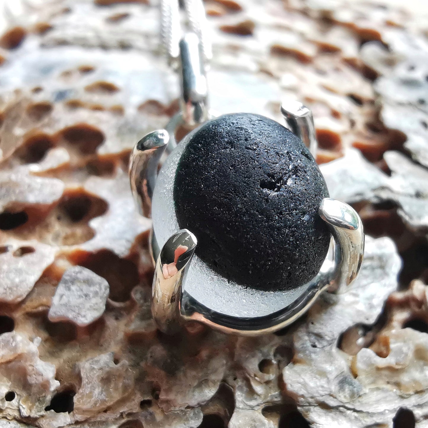 Seaham black and clear multi sea glass & sterling silver pendant.