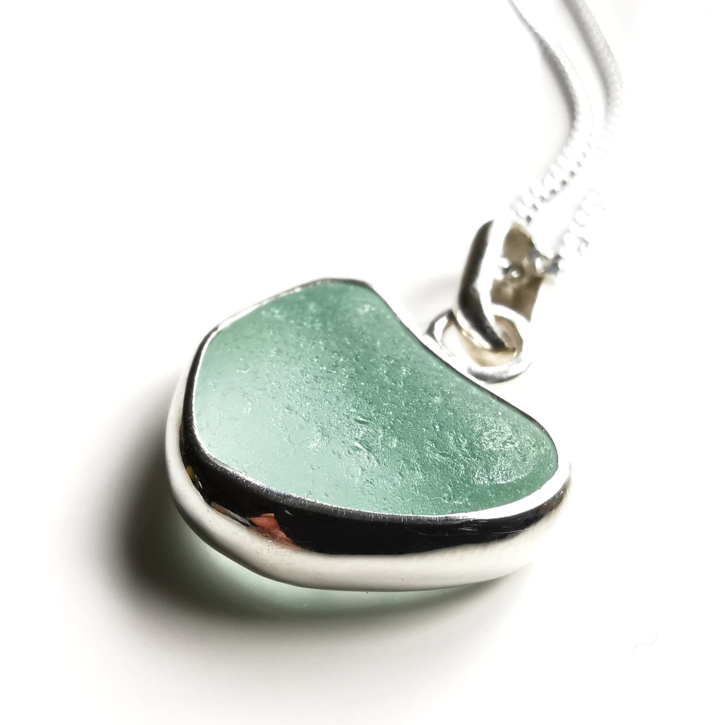 Genuine Scottish sea foam sea glass heart & sterling silver pendant.