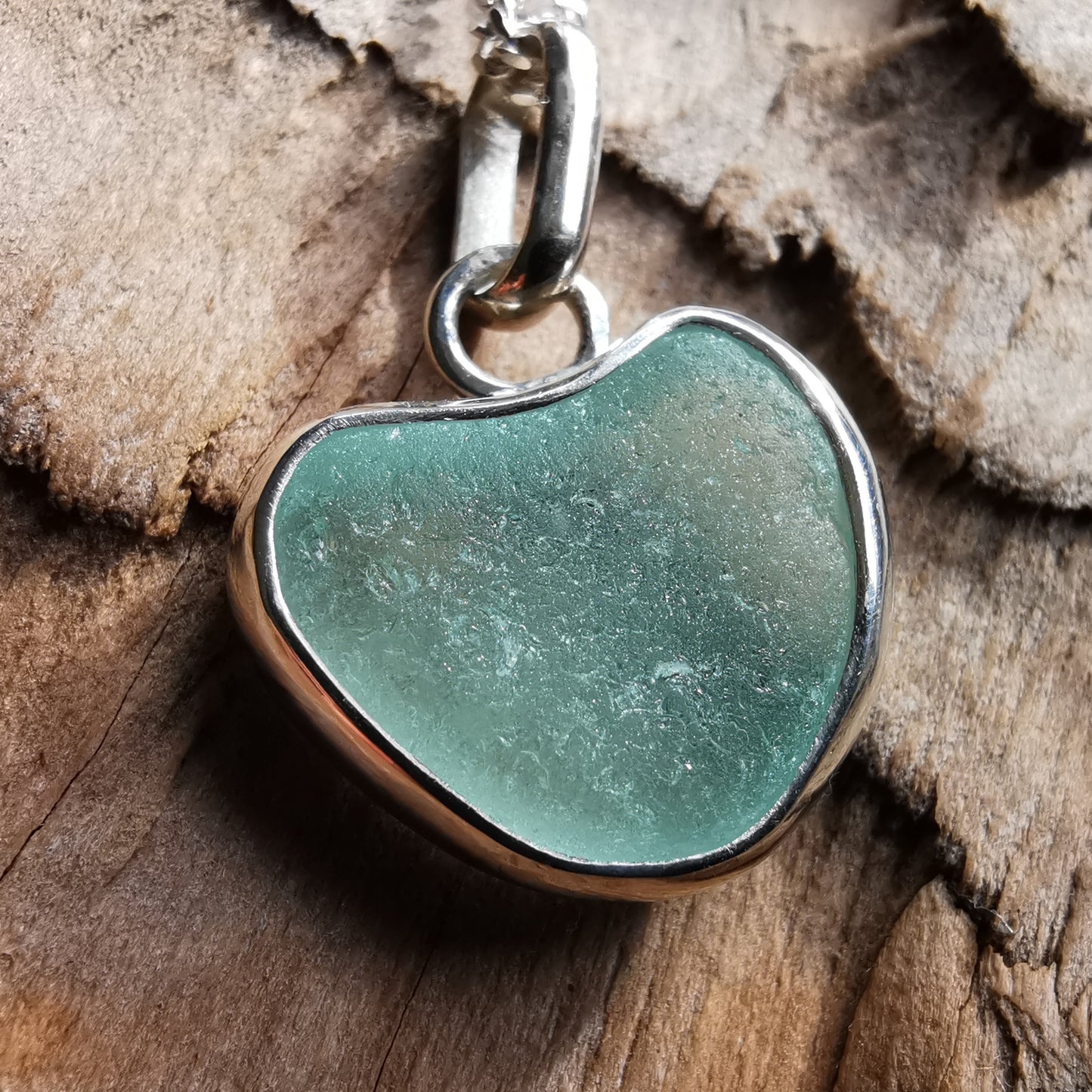 Genuine Scottish sea foam sea glass heart & sterling silver pendant.