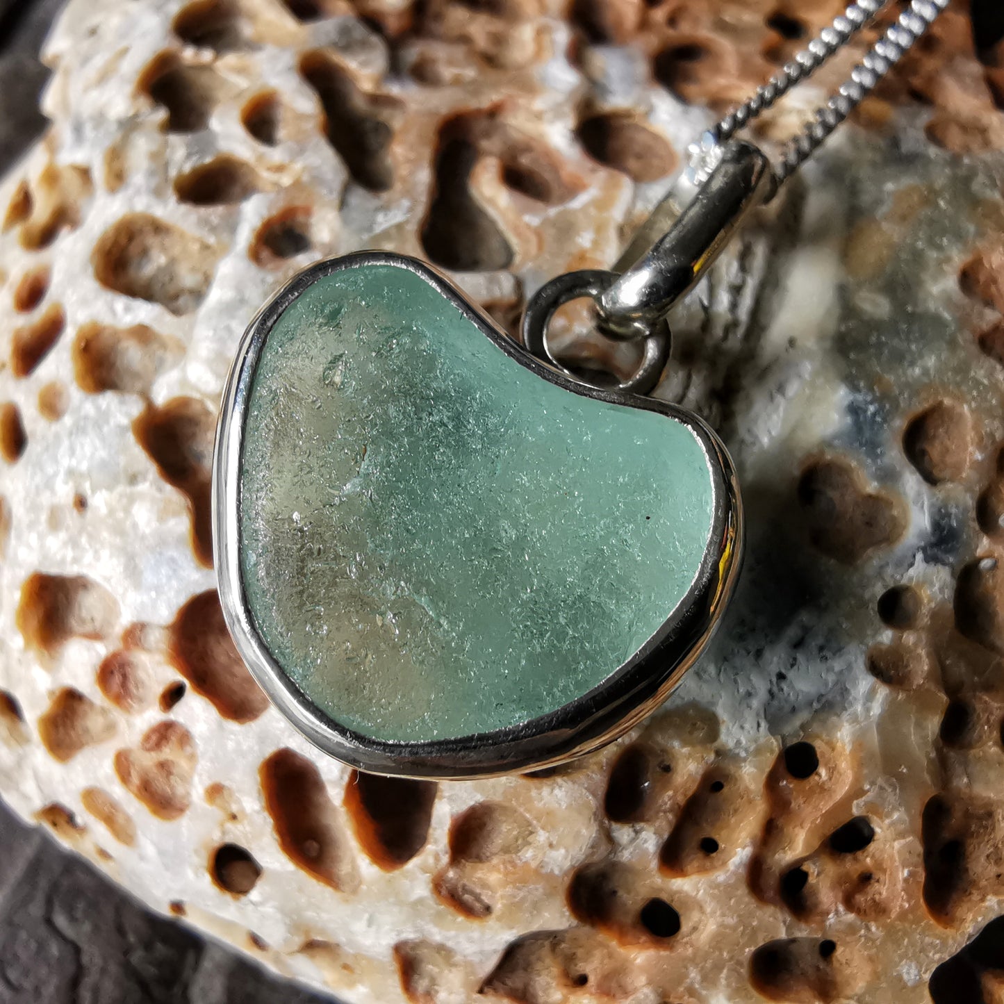 Genuine Scottish sea foam sea glass heart & sterling silver pendant.