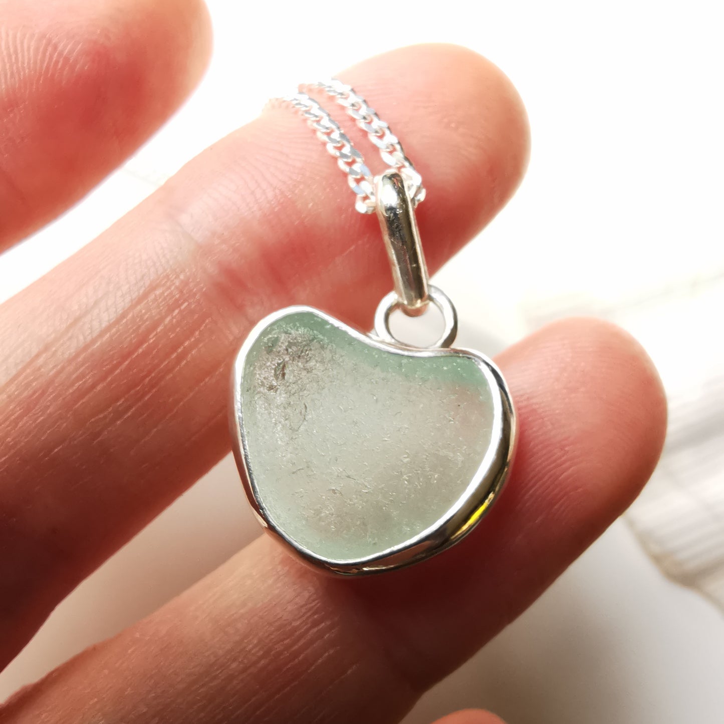 Genuine Scottish sea foam sea glass heart & sterling silver pendant.