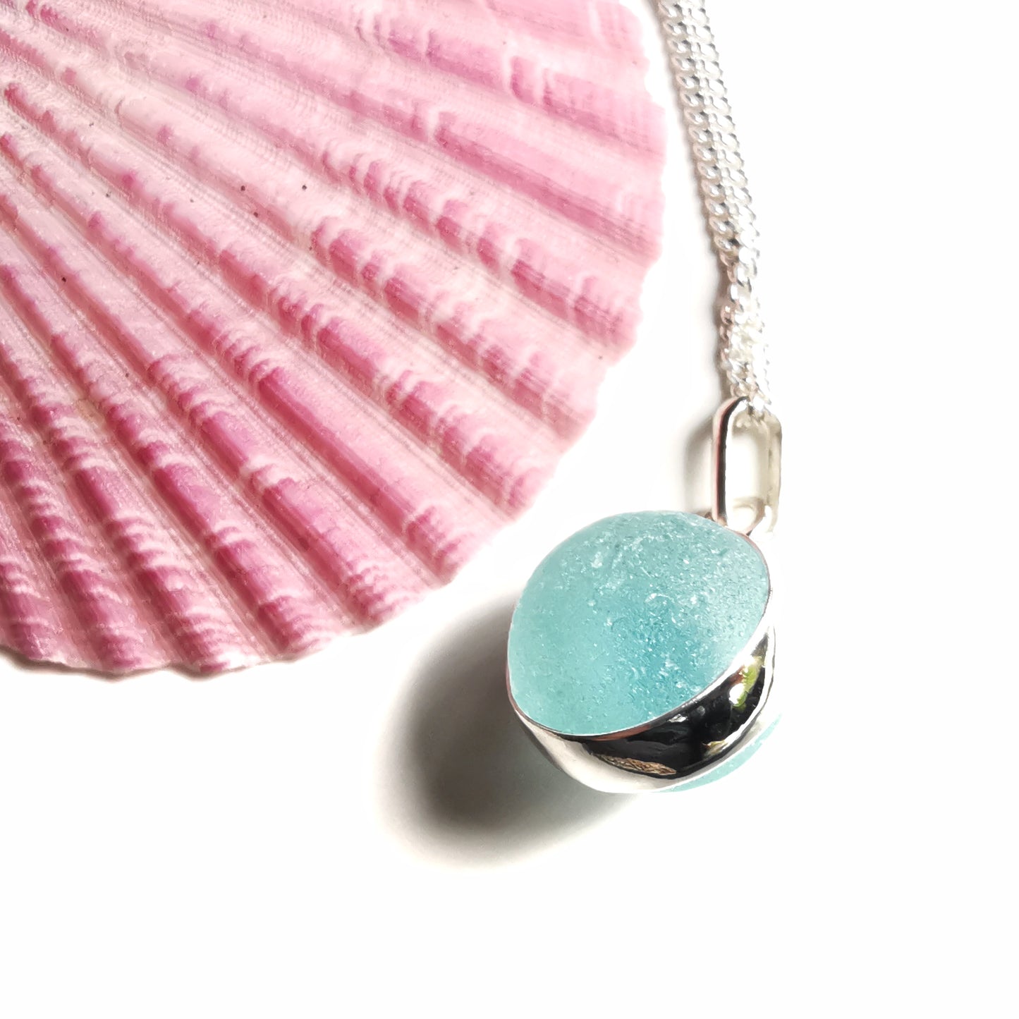 Scottish light aqua blue sea glass marble & sterling silver pendant.