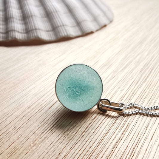 Scottish light aqua blue sea glass marble & sterling silver pendant.