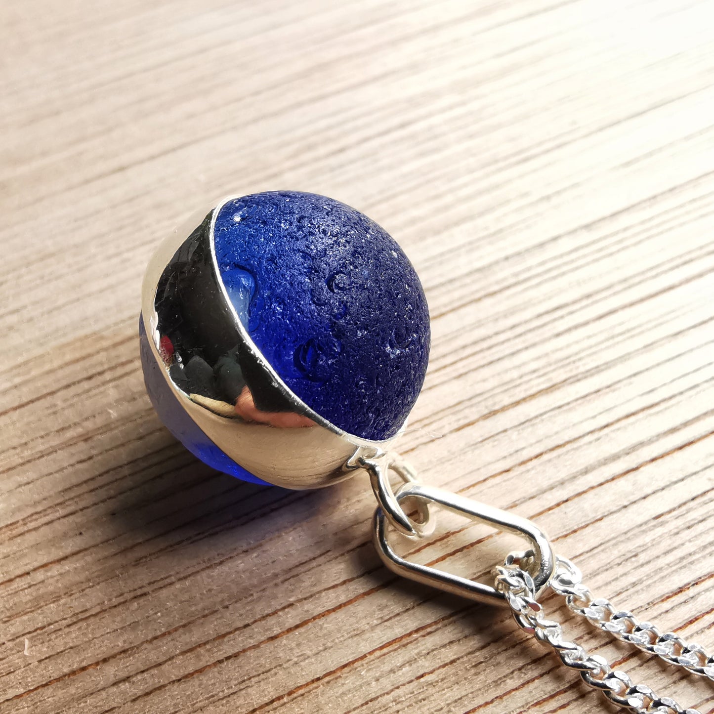 Scottish cobalt blue and white sea glass marble & sterling silver pendant.