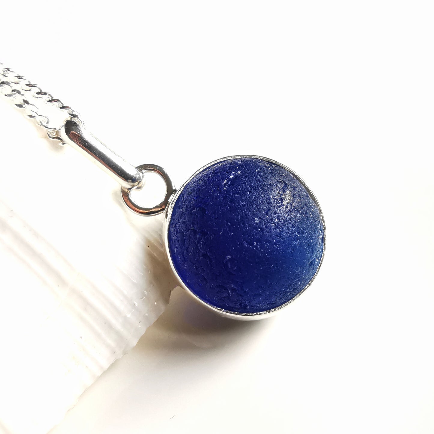 Scottish cobalt blue and white sea glass marble & sterling silver pendant.