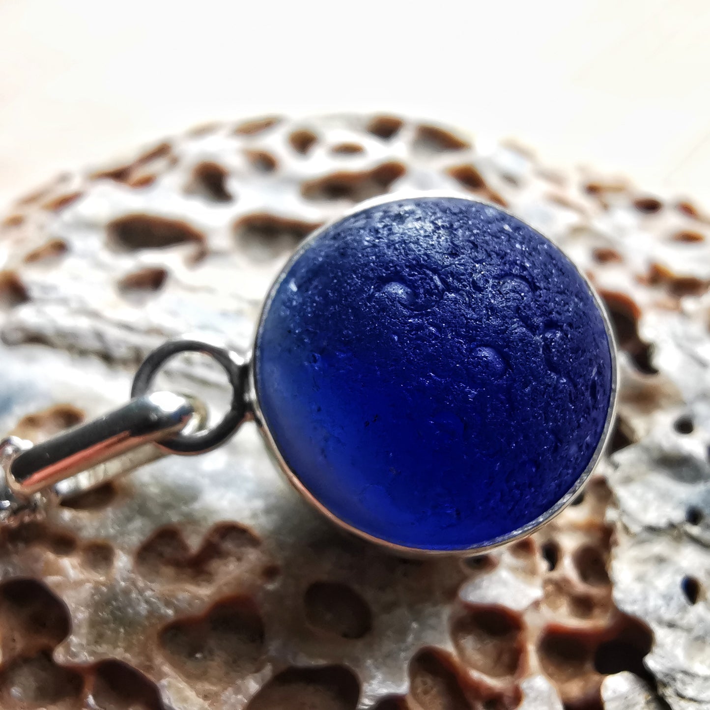 Scottish cobalt blue and white sea glass marble & sterling silver pendant.