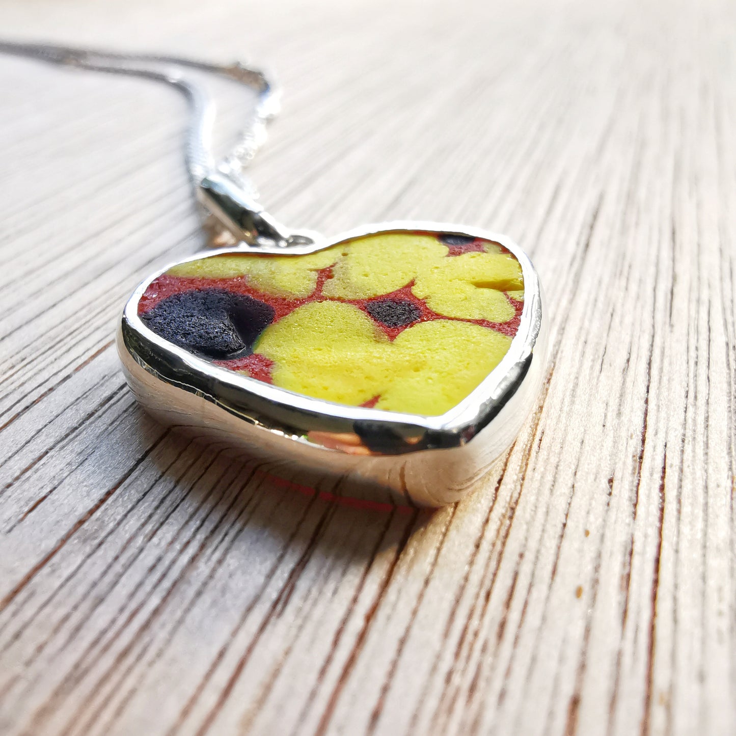 Scottish multi coloured sea glass heart & sterling silver pendant.