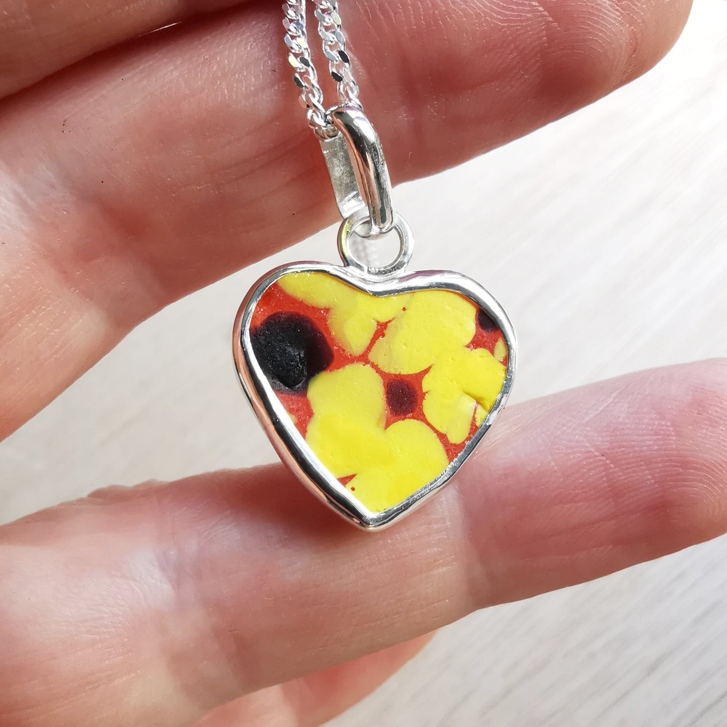 Scottish multi coloured sea glass heart & sterling silver pendant.