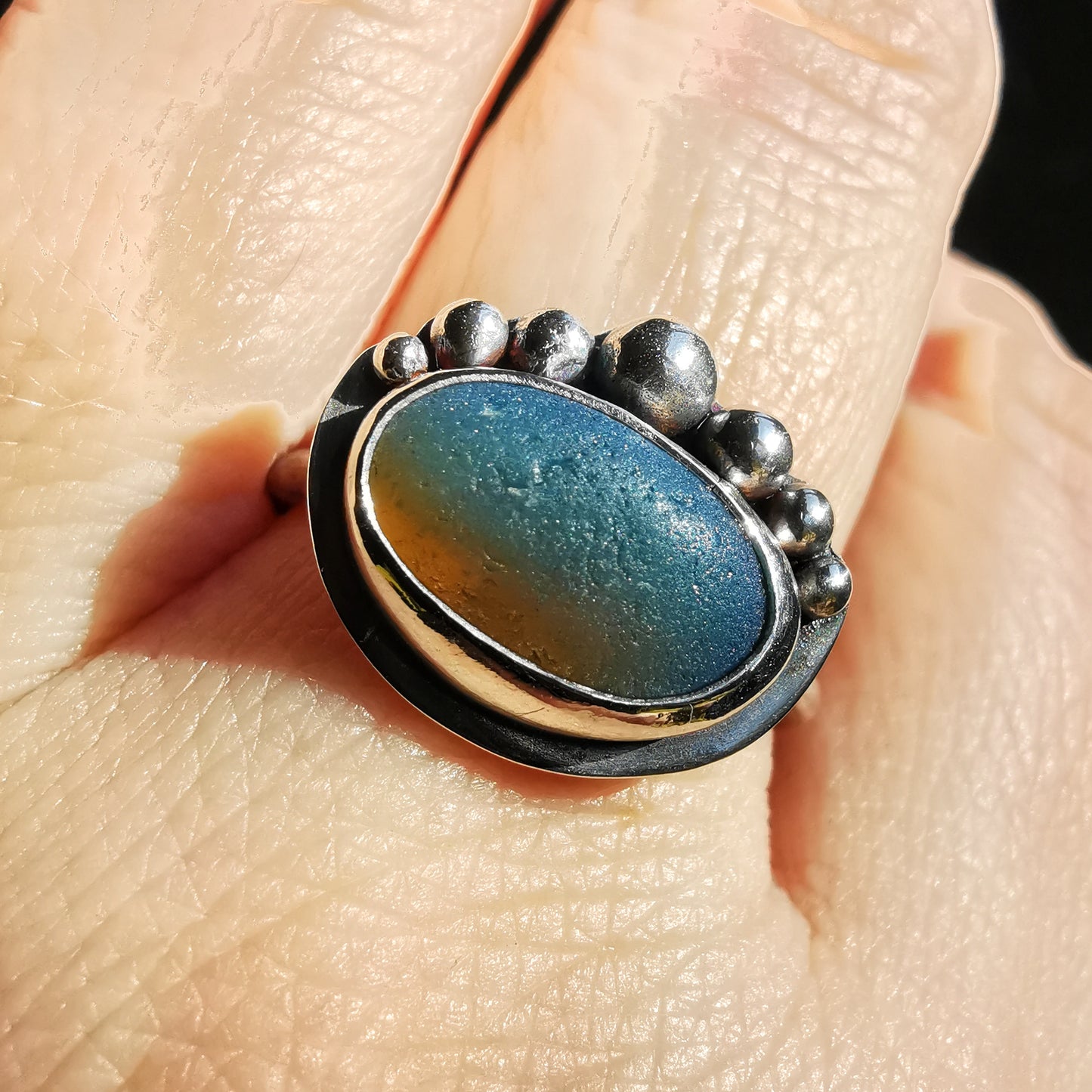 Opalescent sea glass & sterling silver adjustable ring.