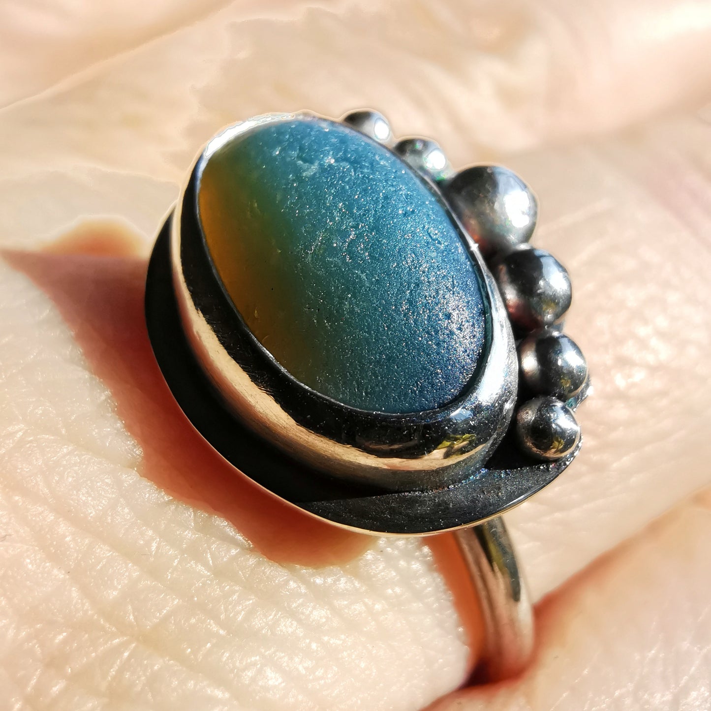 Opalescent sea glass & sterling silver adjustable ring.