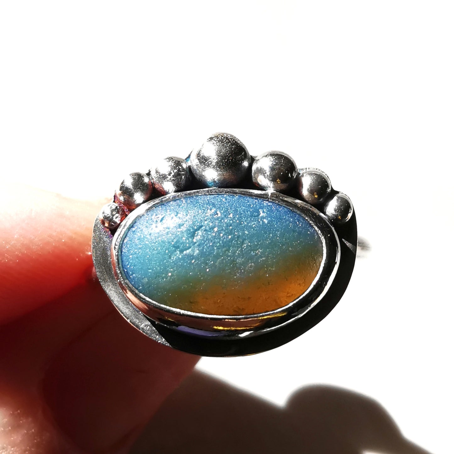 Opalescent sea glass & sterling silver adjustable ring.