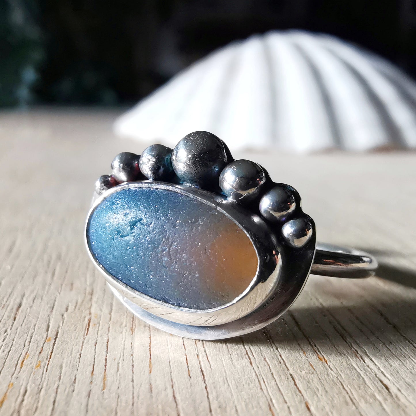 Opalescent sea glass & sterling silver adjustable ring.