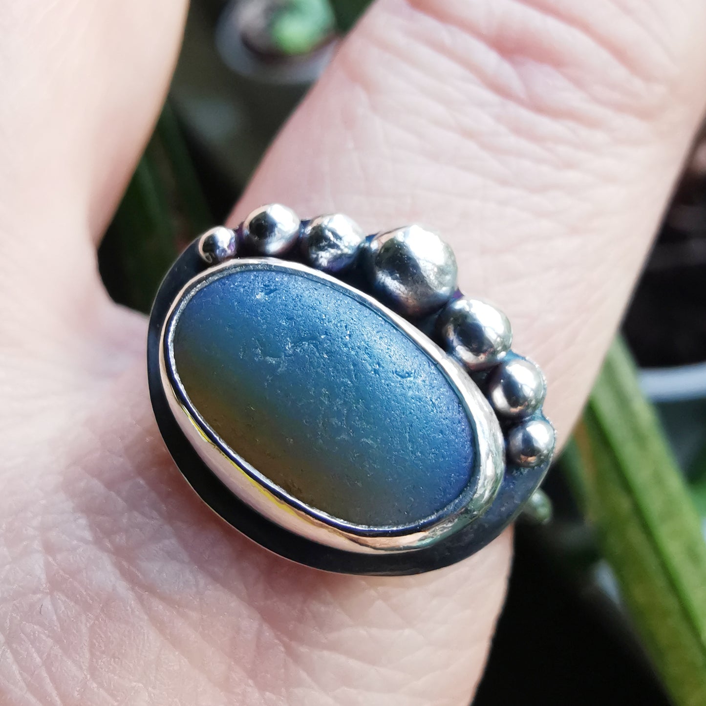 Opalescent sea glass & sterling silver adjustable ring.