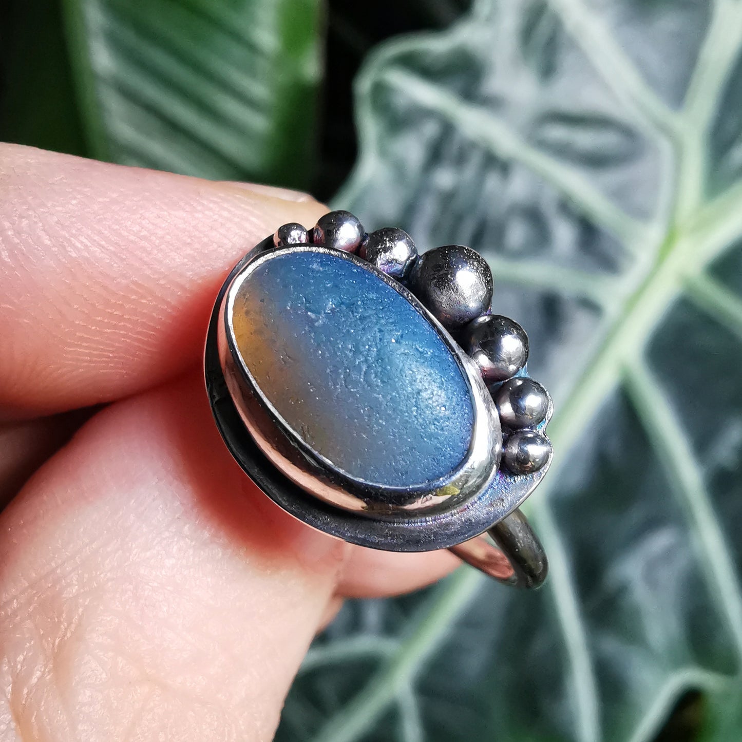 Opalescent sea glass & sterling silver adjustable ring.