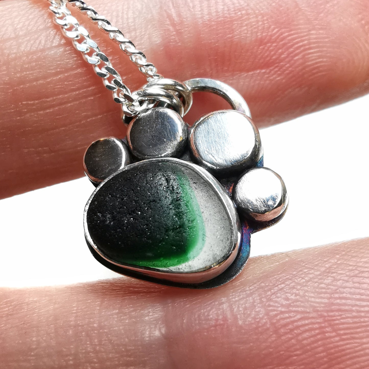 Seaham green and clear multi sea glass & sterling silver paw pendant.