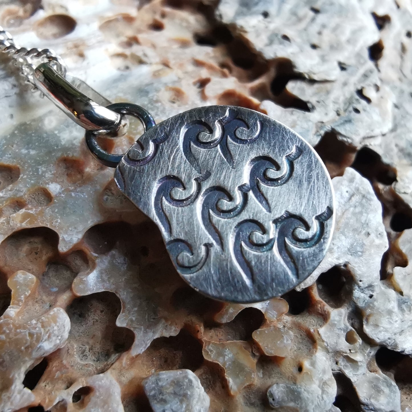 Ammonite fossil & sterling silver pendant.