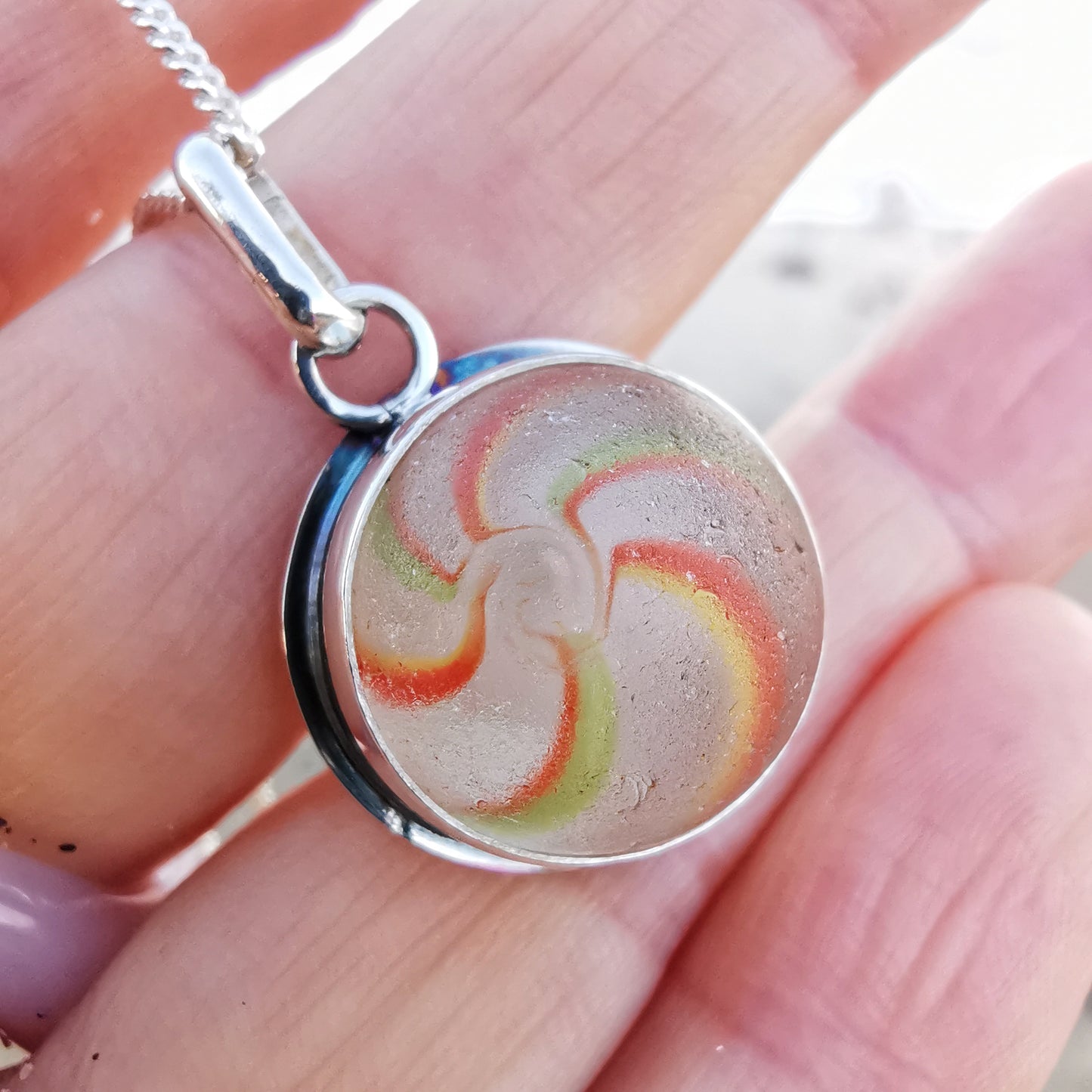 German orange, green, yellow and white sea glass marble & sterling silver pendant.