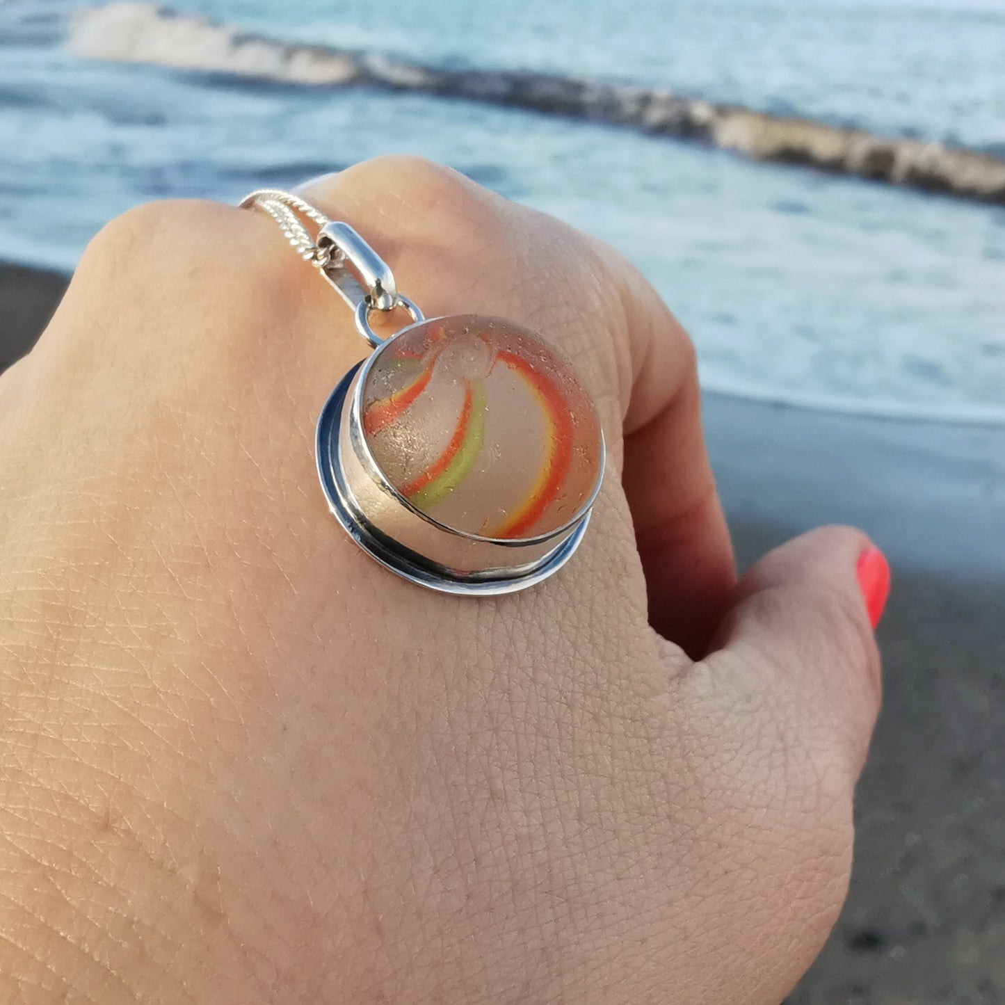 German orange, green, yellow and white sea glass marble & sterling silver pendant.