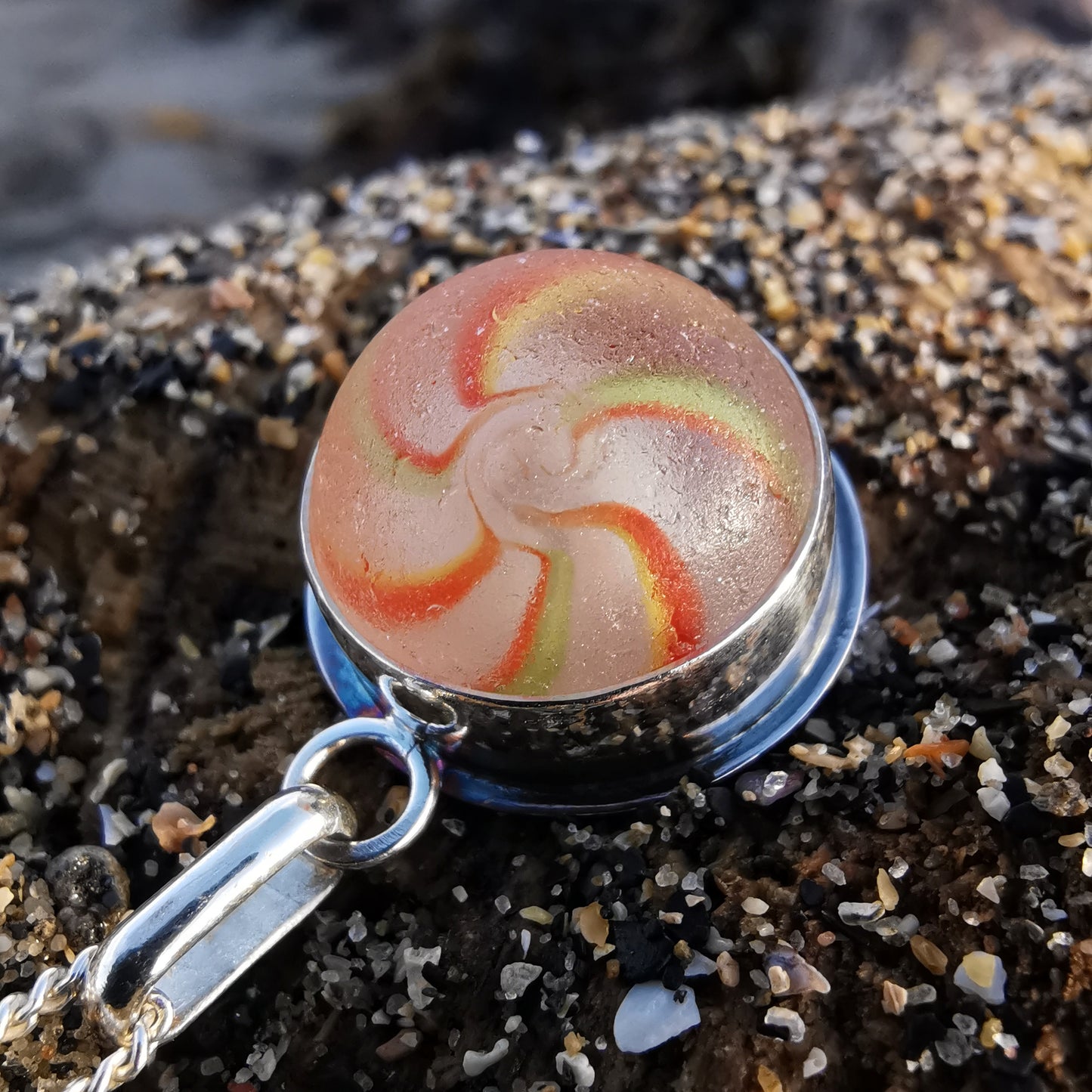 German orange, green, yellow and white sea glass marble & sterling silver pendant.