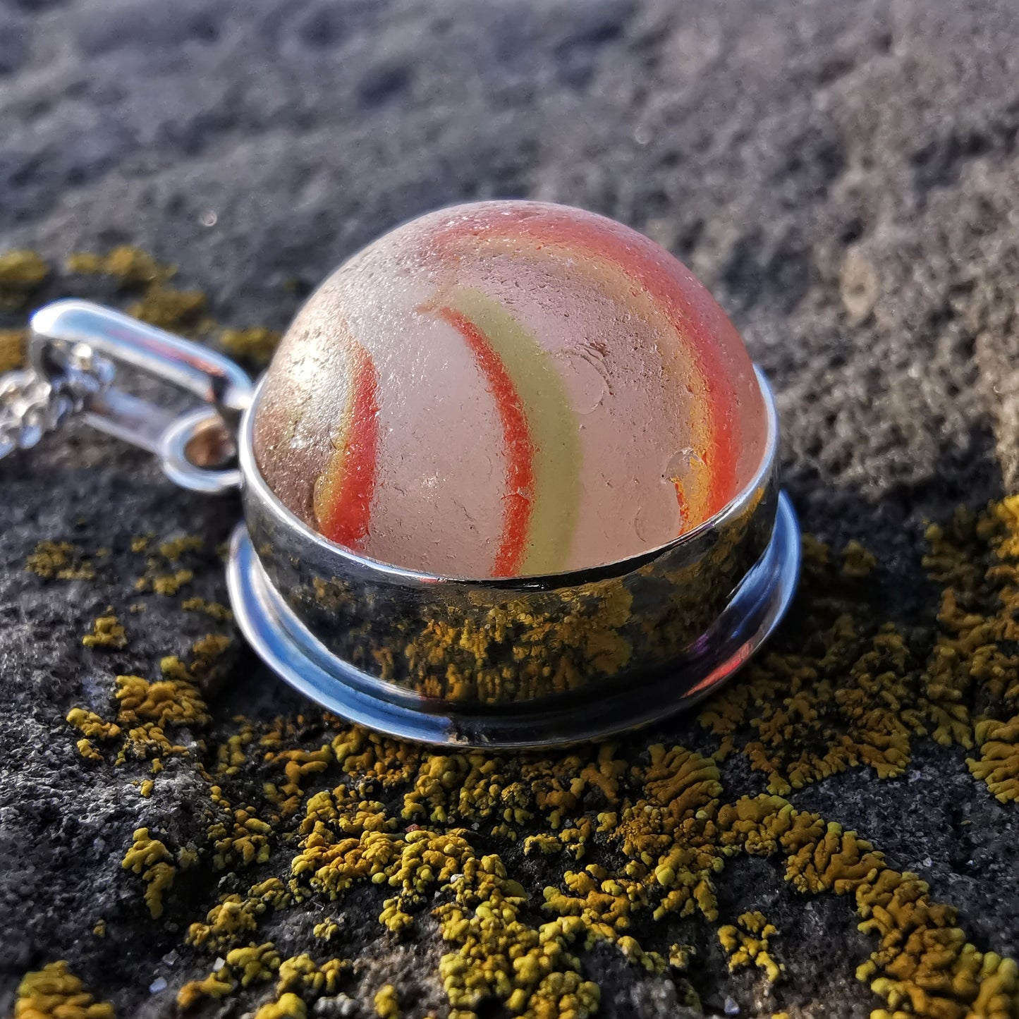 German orange, green, yellow and white sea glass marble & sterling silver pendant.