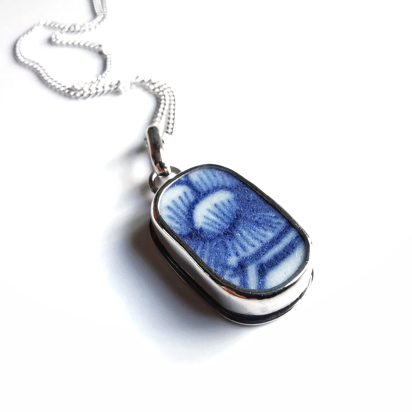 Blue and white sea porcelain & sterling silver pendant.