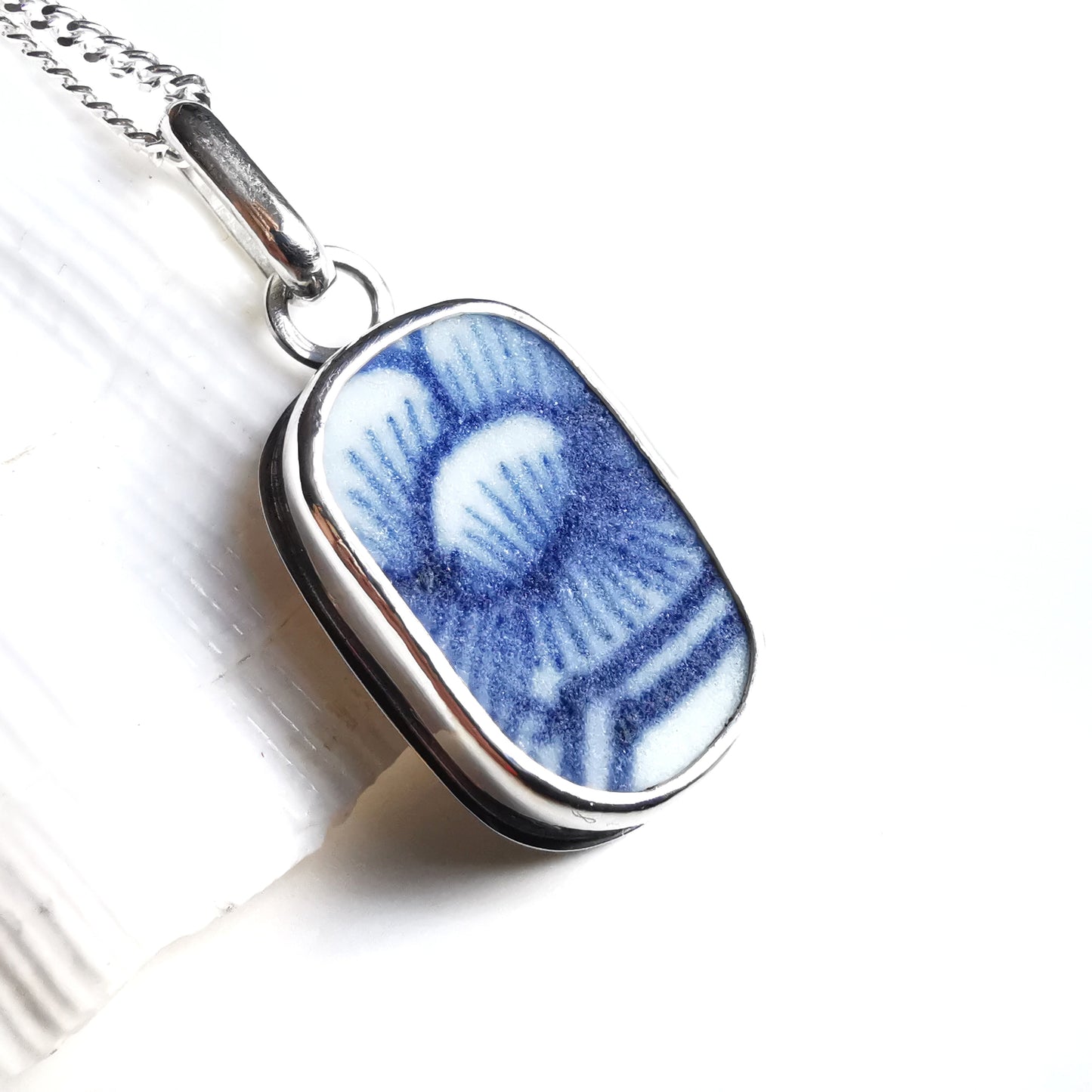 Blue and white sea porcelain & sterling silver pendant.