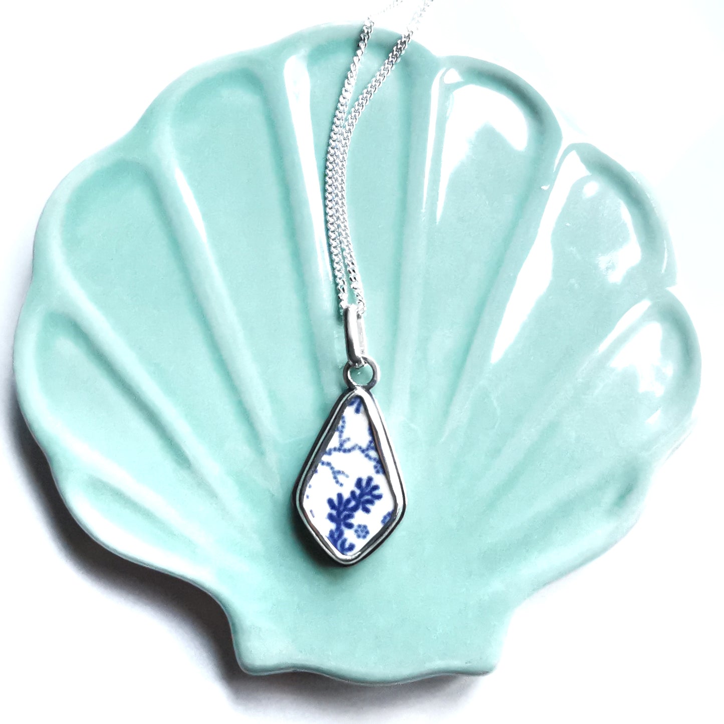 Scottish blue and white seaweed pattern sea pottery & sterling silver pendant.