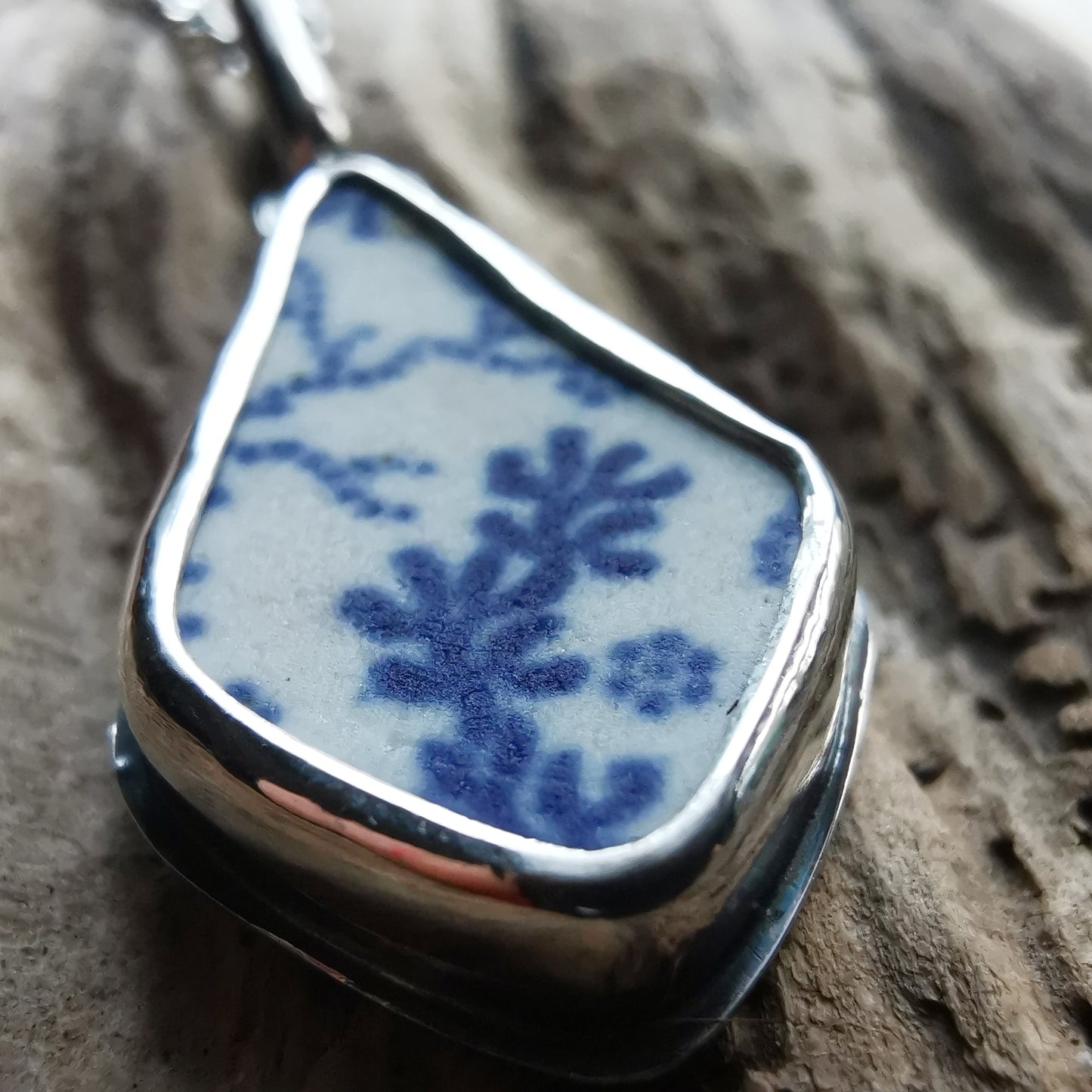 Scottish blue and white seaweed pattern sea pottery & sterling silver pendant.