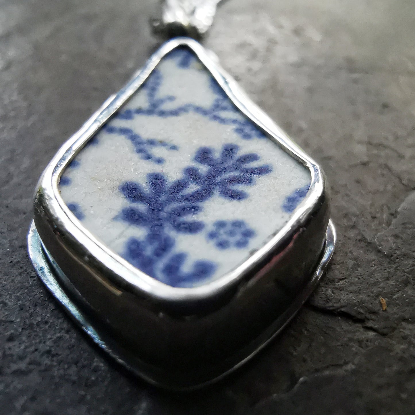 Scottish blue and white seaweed pattern sea pottery & sterling silver pendant.