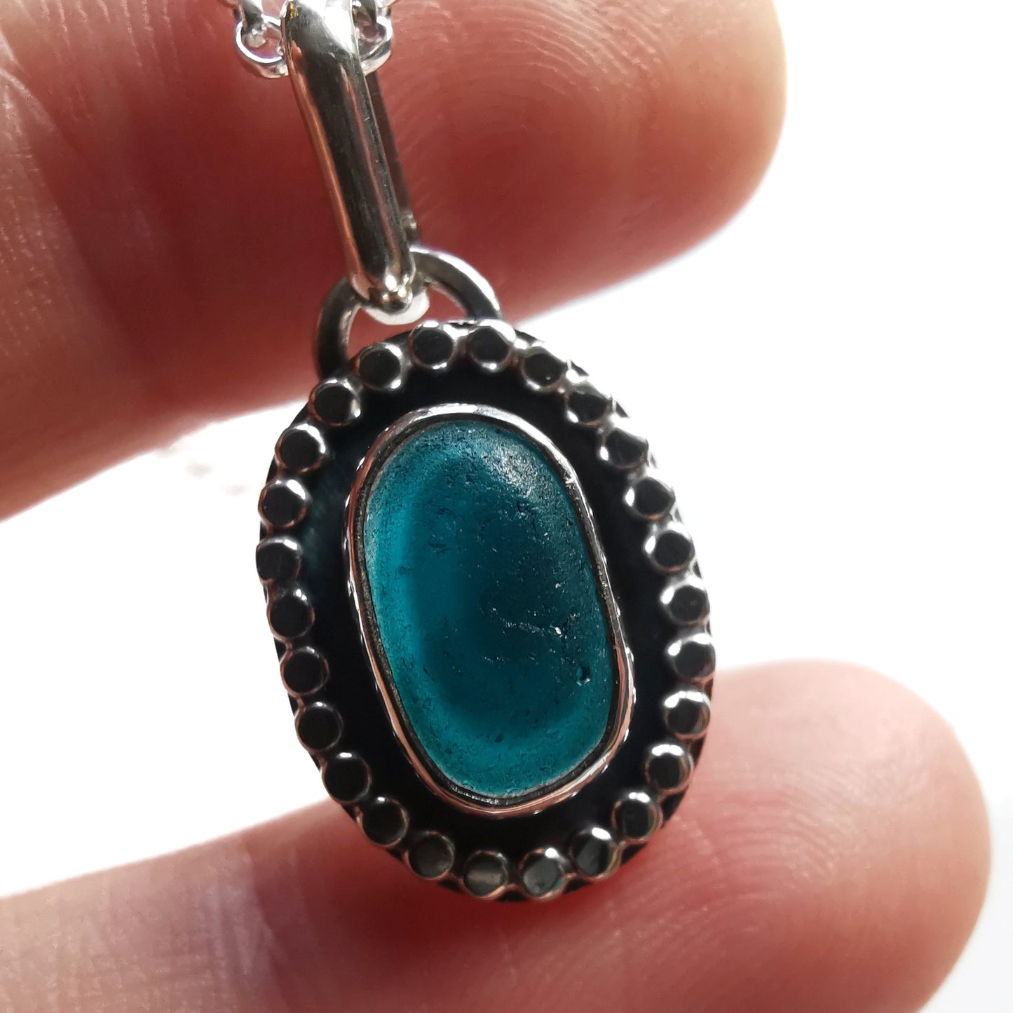 Tiny teal multi Seaham sea glass & sterling silver pendant.