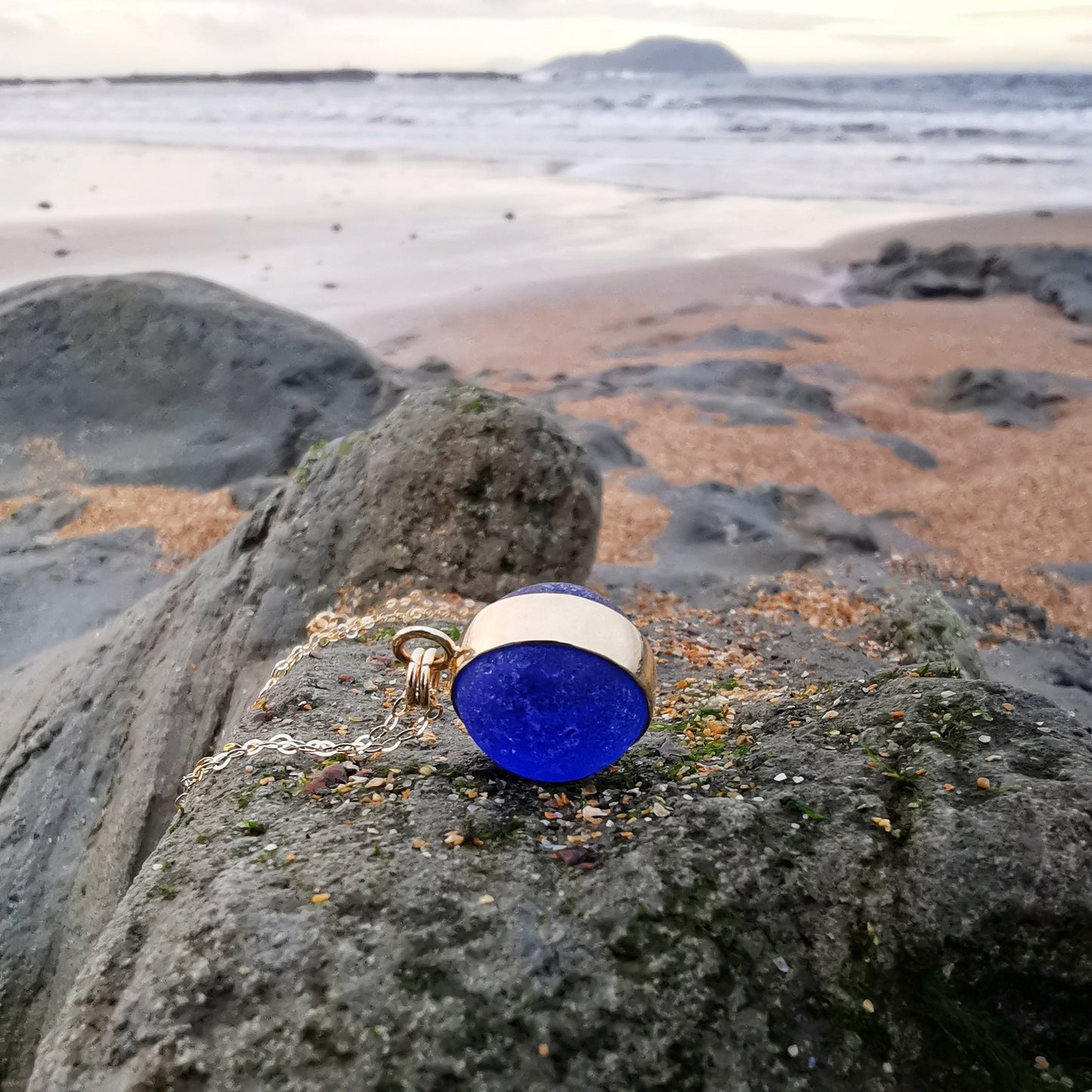 Genuine Scottish cobalt blue sea glass marble & 9 ct gold pendant