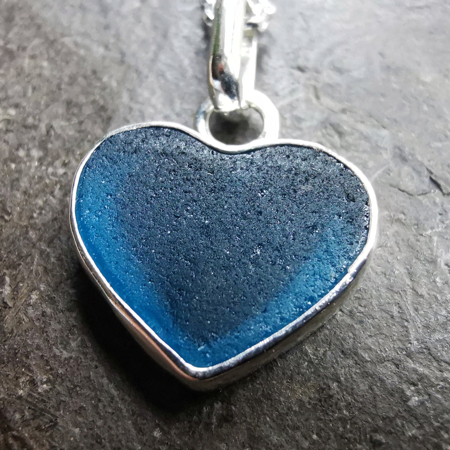 Reserved. Scottish teal blue sea glass heart & sterling silver pendant.