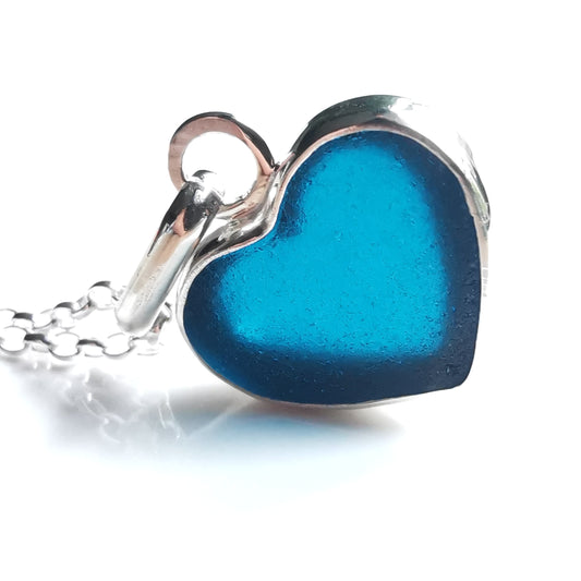 Reserved. Scottish teal blue sea glass heart & sterling silver pendant.