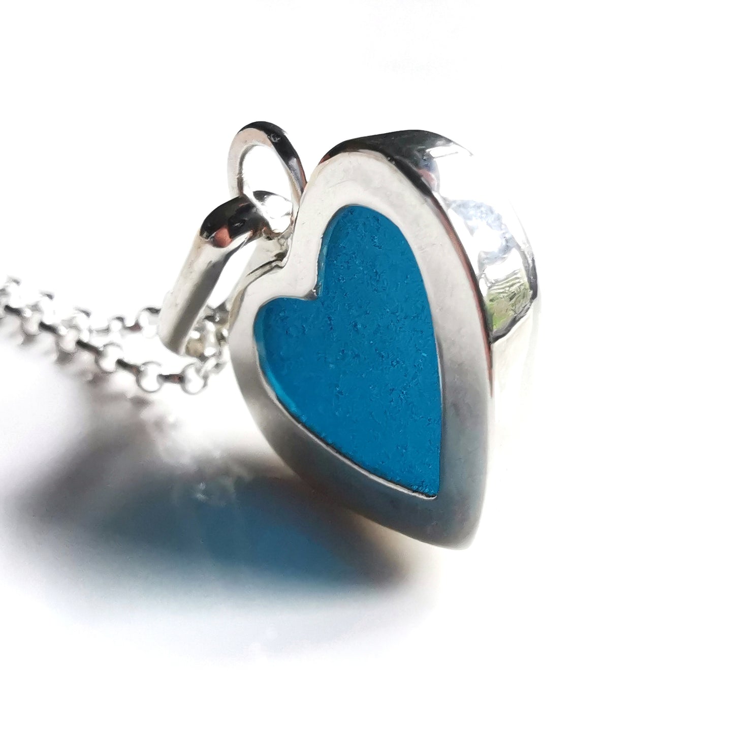 Reserved. Scottish teal blue sea glass heart & sterling silver pendant.