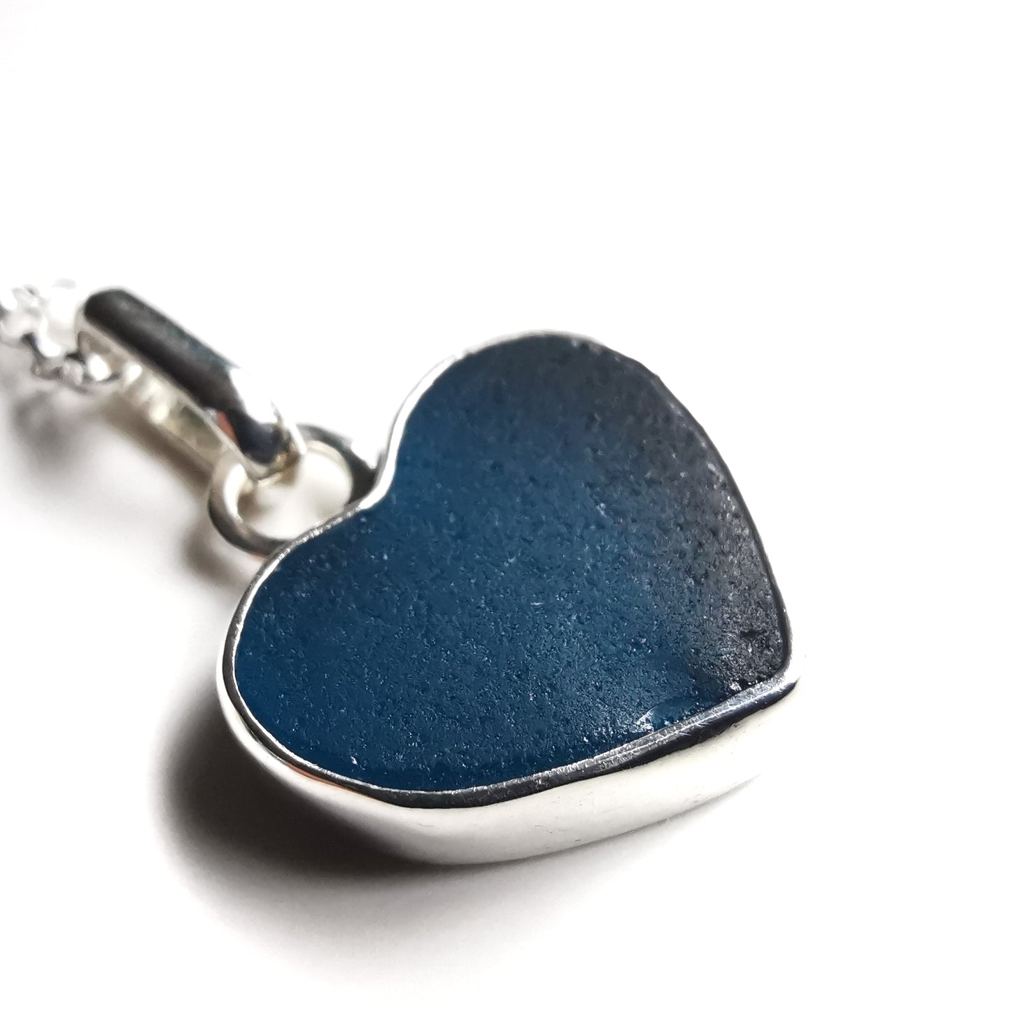 Reserved. Scottish teal blue sea glass heart & sterling silver pendant.