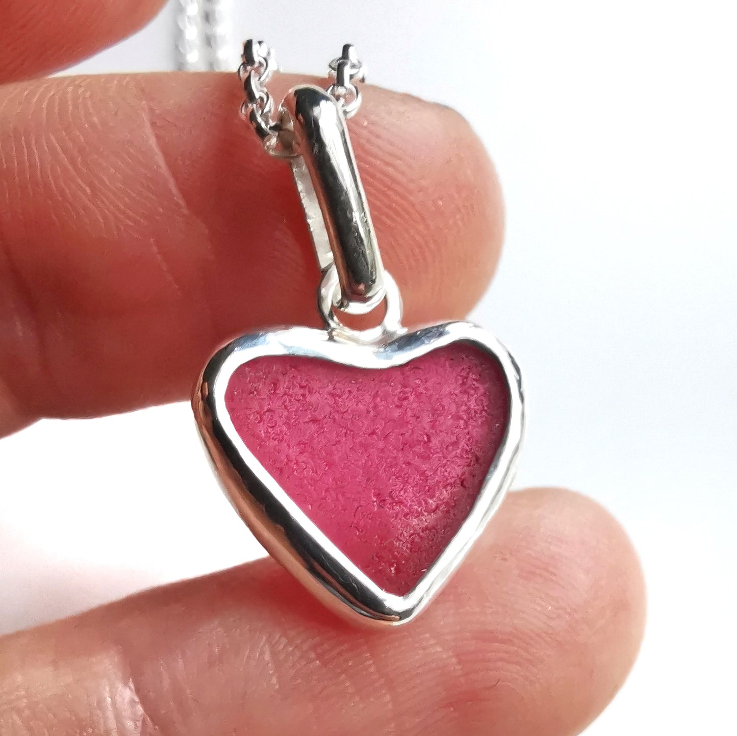 Magenta pink sea glass heart & sterling silver pendant.