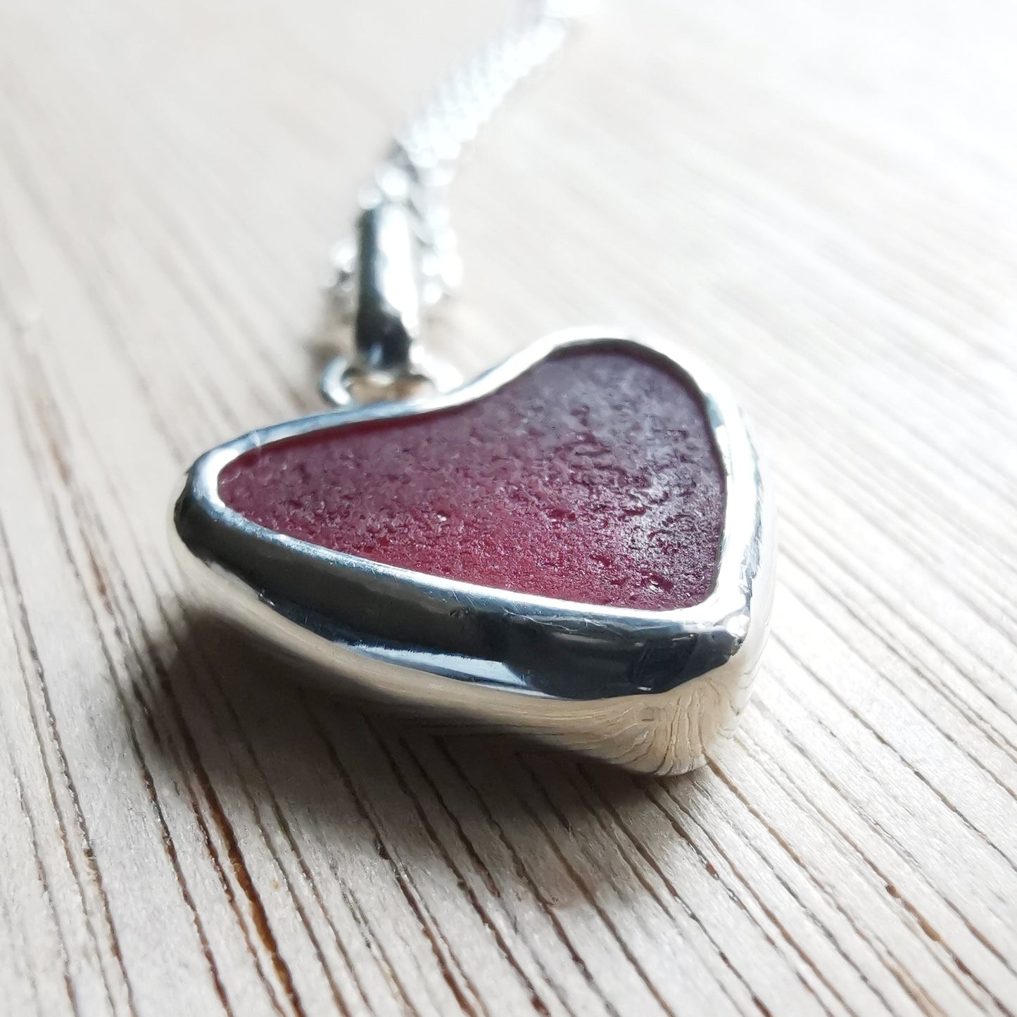 Magenta pink sea glass heart & sterling silver pendant.