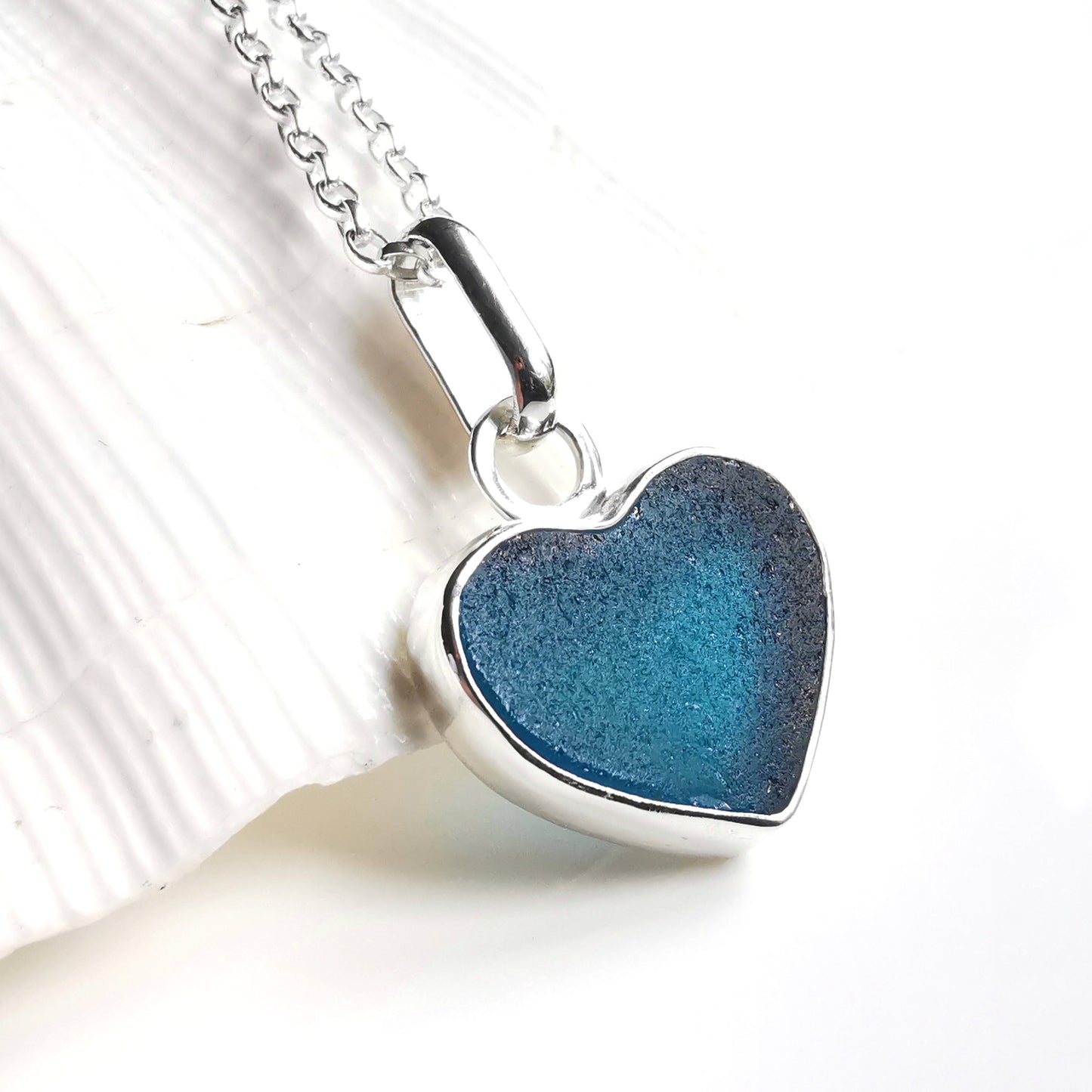 Reserved. Scottish teal blue sea glass heart & sterling silver pendant.